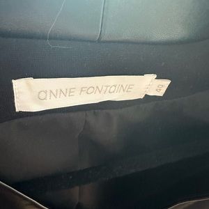 Beautiful Anne Fontaine blazer with leather trim. Zip sleeves.